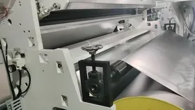 RLínea de recubrimiento y laminación por extrusión para materiales aislantes
